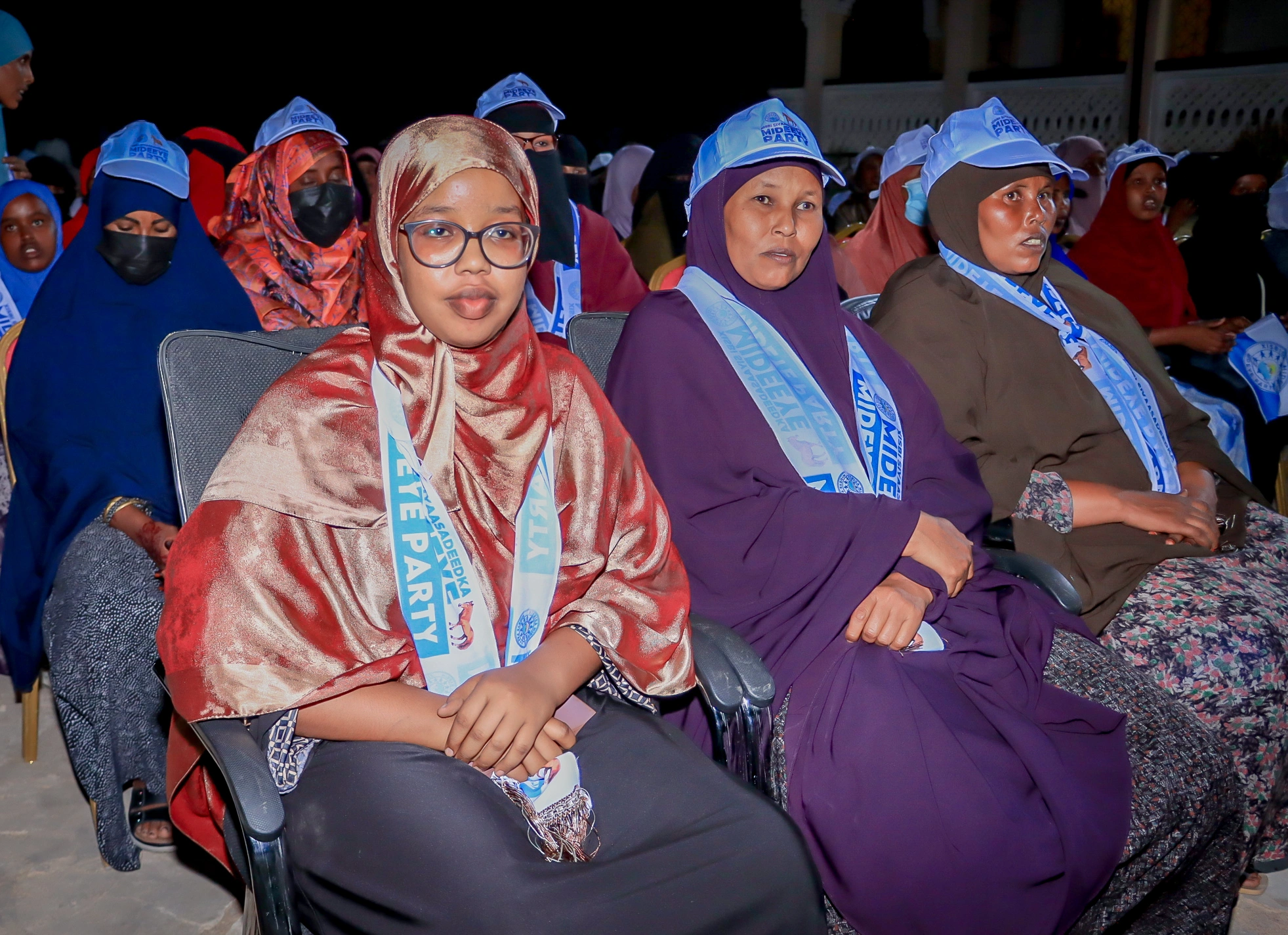 Women and youth attending a Mideeye public gathering