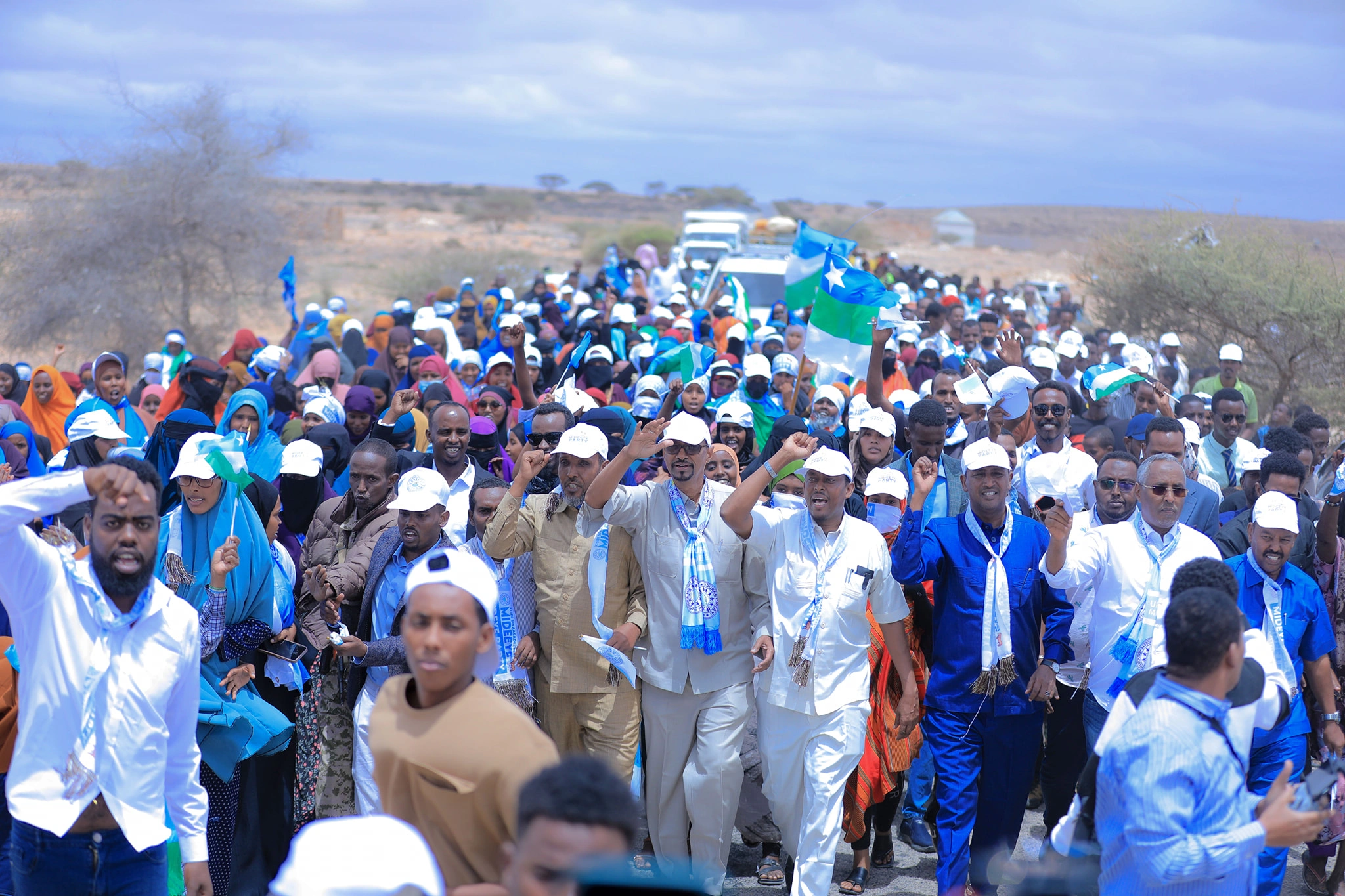 Mideeye supporters marching together in support of unity
